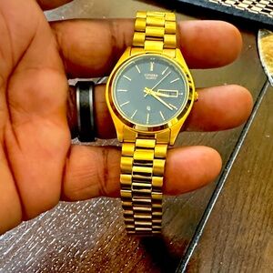 Citizen Men's Gold Watch with Black Dial